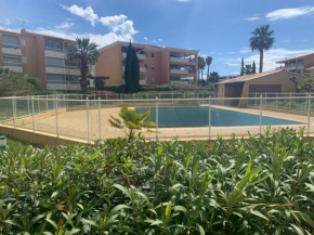 T2 en rez de jardin avec piscine